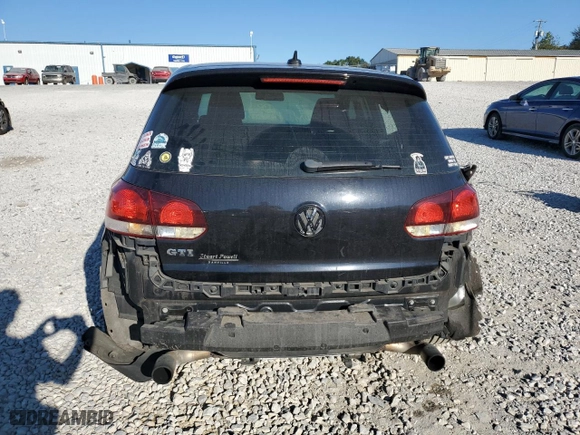2013 Volkswagen GTI with VIN WVWGV7AJ6DW122140, listed as a Copart auction lot 76023474 with 151456 miles and Salvage Title. Bid and sale history available at carsss.com. Image 6.