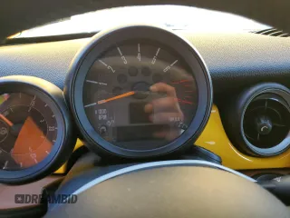 2015 MINI Roadster S z VIN WMWSY3C53FT595389, wystawiony jako Copart lot #77476814 z przebiegiem Nie podano mil oraz Szkody całkowita. Historia ofert i sprzedaży dostępna na DreamBid. Obrazek 9.