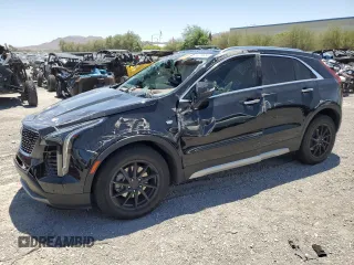 2021 Cadillac XT4 FWD Premium Luxury with VIN 1GYFZCR4XMF004996, listed as a Copart auction lot 61270355 with Not provided miles and Salvage title. Bid and sale history available at DreamBid. Image 1.