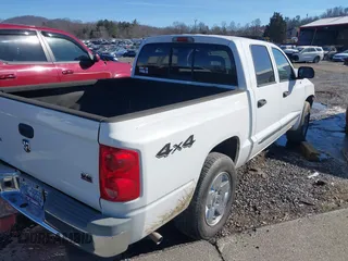 2005 Dodge Dakota Laramie with VIN 1D7HW58N35S189677, listed as a IAAI auction lot 41335613 with 159,501 mi miles and . Bid and sale history available at DreamBid. Image 4.