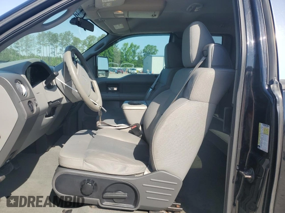 2007 Ford F-150 XLT with VIN 1FTPX14557FA89271, listed as a Copart auction lot 57209295 with 117,519 mi miles and Clean title. Bid and sale history available at DreamBid. Image 7.
