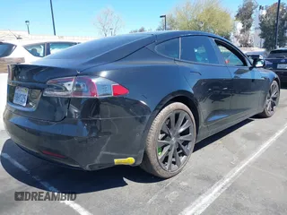 2018 Tesla Model S 75D with VIN 5YJSA1E20JF282889, listed as a IAAI auction lot 41823505 with 110,049 mi miles and . Bid and sale history available at DreamBid. Image 4.