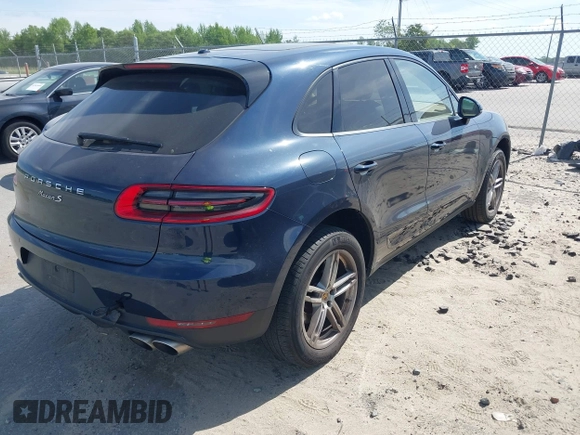 2015 Porsche Macan S with VIN WP1AB2A55FLB67075, listed as a IAAI auction lot 42068637 with 148,068 mi miles. Bid and sale history available at carsss.com. Image 4.
