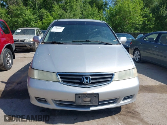 2004 Honda Odyssey EX-L with VIN 5FNRL18934B018040, listed as a IAAI auction lot 42241081 with 250,607 mi miles and . Bid and sale history available at DreamBid. Image 6.