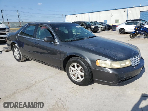 2002 Cadillac Seville Luxury SLS z VIN 1G6KS54YX2U154438, wystawiony jako Copart lot #67893314 z przebiegiem 115 313 mil mil oraz Szkody całkowita. Historia ofert i sprzedaży dostępna na DreamBid. Obrazek 4.