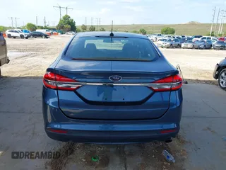 2018 Ford Fusion SE z VIN 3FA6P0HD8JR201052, wystawiony jako IAAI lot #42367050 z przebiegiem 90 502 mil mil oraz . Historia ofert i sprzedaży dostępna na DreamBid. Obrazek 16.