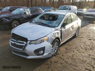 2012 Subaru Impreza Sedan 2.0i Premium with VIN JF1GJAC63CH012043, listed as a IAAI auction lot 41837527 with 112,398 mi miles. Bid and sale history available at carsss.com. Image 2.