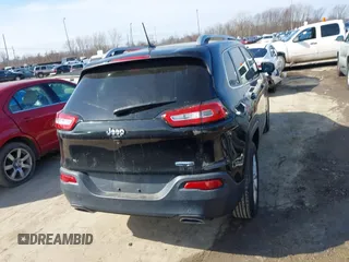 2015 Jeep Cherokee North with VIN 1C4PJMCS4FW792918, listed as a IAAI auction lot 41748651 with 107,034 mi miles. Bid and sale history available at carsss.com. Image 17.