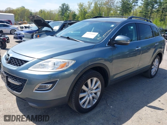 2010 Mazda CX-9 Touring z VIN JM3TB3MV4A0224881, wystawiony jako IAAI lot #42234860 z przebiegiem 176 938 mil mil oraz . Historia ofert i sprzedaży dostępna na DreamBid. Obrazek 2.