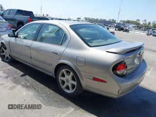 2001 Nissan Maxima GXE with VIN JN1CA31D41T815592, listed as a IAAI auction lot 42465005 with 96,822 mi miles and . Bid and sale history available at DreamBid. Image 3.