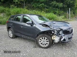 2015 Mazda CX-5 Sport with VIN JM3KE4BYXF0511249, listed as a Copart auction lot 63310695 with 208,615 mi miles and Salvage title. Bid and sale history available at DreamBid. Image 4.