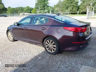 2015 Kia Optima EX with VIN 5XXGN4A75FG351223, listed as a IAAI auction lot 42732567 with 124,400 mi miles and . Bid and sale history available at DreamBid. Image 3.