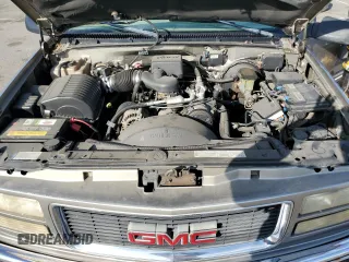 1999 GMC Suburban with VIN 3GKEC16R0XG526194, listed as a Copart auction lot 83740634 with 199,583 mi miles and Clean title. Bid and sale history available at DreamBid. Image 11.