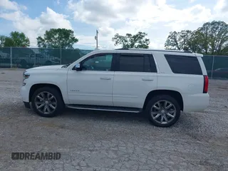 2016 Chevrolet Tahoe LTZ z VIN 1GNSKCKC7GR243183, wystawiony jako IAAI lot #41939209 z przebiegiem 81 903 mil mil oraz . Historia ofert i sprzedaży dostępna na DreamBid. Obrazek 14.