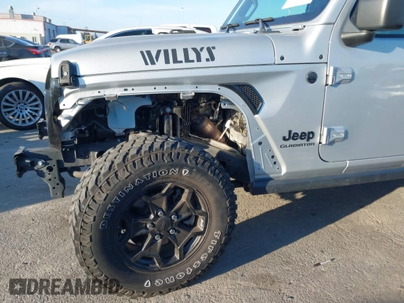 2022 Jeep Gladiator Willys with VIN 1C6HJTAG4NL132558, listed as a IAAI auction lot 41626851 with 28,251 mi miles and . Bid and sale history available at DreamBid. Image 6.