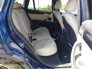 2017 BMW X1 xDrive28i with VIN WBXHT3C39H5F71525, listed as a IAAI auction lot 42050272 with 118,875 mi miles. Bid and sale history available at carsss.com. Image 8.