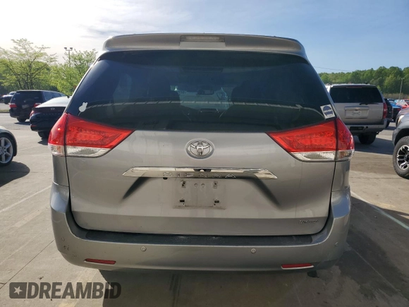 2013 Toyota Sienna XLE AAS with VIN 5TDYK3DC1DS318277, listed as a Copart auction lot 54156935 with 218,564 mi miles and Salvage title. Bid and sale history available at DreamBid. Image 6.