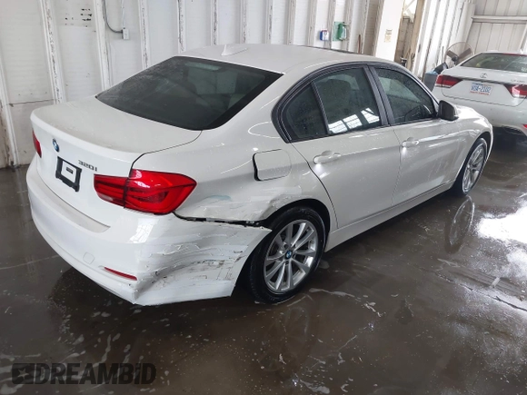 2018 BMW 3 Series 320i with VIN WBA8A9C57JAH13937, listed as a IAAI auction lot 41979917 with 268,115 mi miles. Bid and sale history available at carsss.com. Image 4.