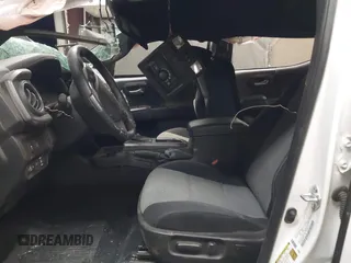 2023 Toyota Tacoma SR with VIN 3TMCZ5ANXPM652495, listed as a IAAI auction lot 42375230 with 26,736 mi miles and . Bid and sale history available at DreamBid. Image 5.