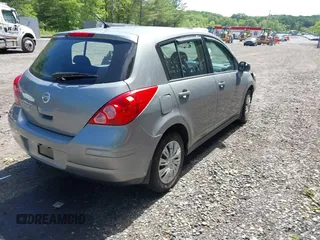 2009 Nissan Versa SL with VIN 3N1BC13E39L383013, listed as a IAAI auction lot 42271316 with 148,279 mi miles and . Bid and sale history available at DreamBid. Image 4.