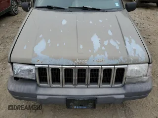 1996 Jeep Grand Cherokee Laredo with VIN 1J4GZ58S7TC403946, listed as a Copart auction lot 71785734 with 231,780 mi miles and Salvage Title. Bid and sale history available at carsss.com. Image 11.