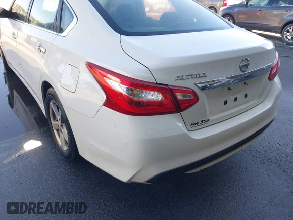 2016 Nissan Altima SV with VIN 1N4AL3AP6GC228866, listed as a IAAI auction lot 41801428 with 170,564 mi miles and . Bid and sale history available at DreamBid. Image 14.