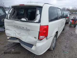 2012 Dodge Grand Caravan SXT with VIN 2C4RDGCG8CR294836, listed as a IAAI auction lot 41995385 with 184,475 mi miles and . Bid and sale history available at DreamBid. Image 4.