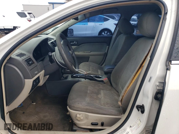 2012 Ford Fusion SE z VIN 3FAHP0HA3CR194075, wystawiony jako Copart lot #63380895 z przebiegiem 176 634 mil mil oraz Szkoda całkowita • Salvage title. Historia ofert i sprzedaży dostępna na DreamBid. Obrazek 7.