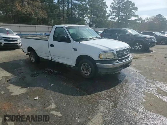2003 Ford F-150 XL with VIN 1FTRF17W33NA54471, listed as a Copart auction lot 42594765 with 134,409 mi miles and Salvage Title. Bid and sale history available at DreamBid. Image 13.