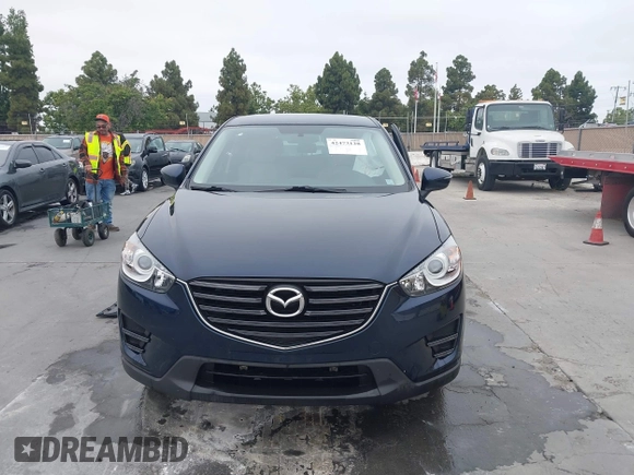 2016 Mazda CX-5 Sport с VIN JM3KE2BY2G0856071, выставлен на аукционе IAAI как лот 42473128 с пробегом 57 250 миль миль и . История ставок и продаж доступна на DreamBid. Изображение 12.