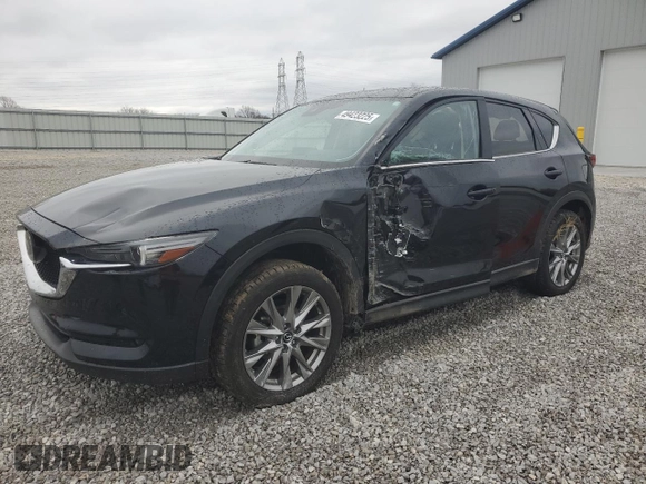2021 Mazda CX-5 Grand Touring with VIN JM3KFBDM3M1423520, listed as a Copart auction lot 49423225 with 38,918 mi miles and Salvage Title. Bid and sale history available at carsss.com. Image 1.