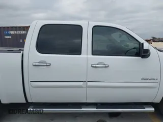 2011 GMC Sierra 1500 Denali z VIN 3GTP2XE25BG404518, wystawiony jako IAAI lot #41504566 z przebiegiem 187 926 mil mil oraz . Historia ofert i sprzedaży dostępna na DreamBid. Obrazek 13.