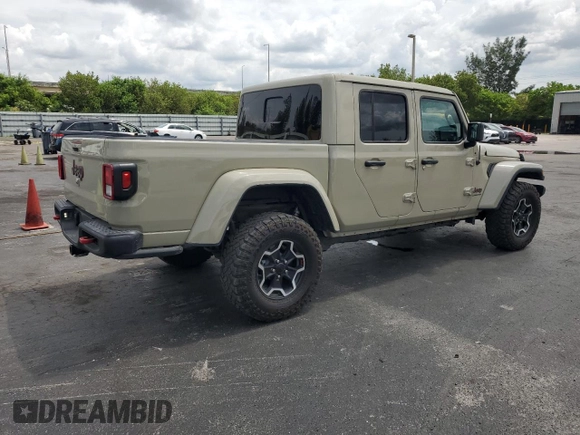 2022 Jeep Gladiator Rubicon с VIN 1C6JJTBG2NL171598, выставлен на аукционе Copart как лот 59494925 с пробегом 46 097 миль миль и Списание • Salvage title. История ставок и продаж доступна на DreamBid. Изображение 3.