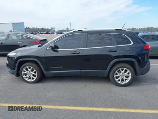 2014 Jeep Cherokee Latitude with VIN 1C4PJLCB0EW288309, listed as a IAAI auction lot 41624746 with 164,037 mi miles and . Bid and sale history available at DreamBid. Image 14.