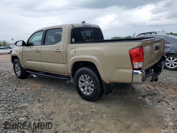 2017 Toyota Tacoma SR5 with VIN 5TFAZ5CN2HX030781, listed as a Copart auction lot 53957535 with 105,606 mi miles and Salvage Title. Bid and sale history available at DreamBid. Image 2.