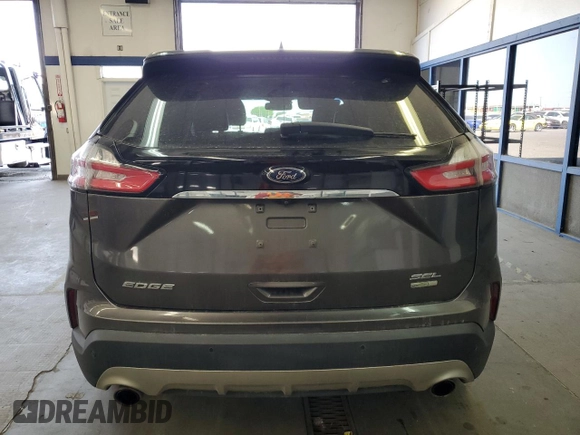 2019 Ford Edge SEL with VIN 2FMPK4J95KBB76844, listed as a Copart auction lot 59323925 with 122,326 mi miles and Salvage title. Bid and sale history available at DreamBid. Image 6.
