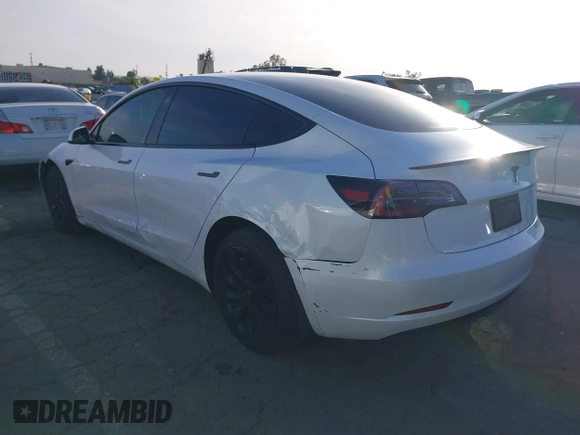 2023 Tesla Model 3 with VIN 5YJ3E1EA0PF503352, listed as a IAAI auction lot 41718658 with 28,426 mi miles and . Bid and sale history available at DreamBid. Image 3.