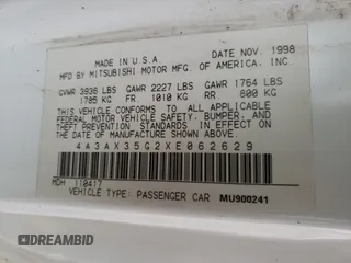 1999 Mitsubishi Eclipse GS with VIN 4A3AX35G2XE062629, listed as a Copart auction lot 87689125 with 223,210 mi miles and Salvage Title. Bid and sale history available at carsss.com. Image 10.