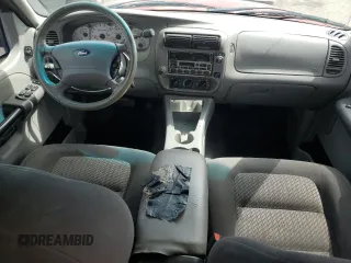 2003 Ford Explorer Sport Trac XLS z VIN 1FMZU67EX3UA71831, wystawiony jako Copart lot #57167025 z przebiegiem 145 290 mil mil oraz Szkoda całkowita • Salvage title. Historia ofert i sprzedaży dostępna na DreamBid. Obrazek 8.