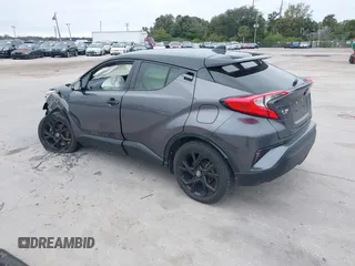 2021 Toyota C-HR LE with VIN JTNKHMBX3M1120177, listed as a IAAI auction lot 41257866 with 43,964 mi miles. Bid and sale history available at carsss.com. Image 3.