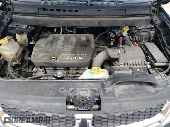 2015 Dodge Journey American Value with VIN 3C4PDCAB2FT547836, listed as a Copart auction lot 54337615 with 169,288 mi miles and Salvage Title. Bid and sale history available at DreamBid. Image 12.