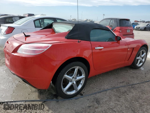2009 Saturn Sky z VIN 1G8MN35B79Y103875, wystawiony jako Copart lot #74669844 z przebiegiem Nie podano mil oraz Szkody całkowita. Historia ofert i sprzedaży dostępna na DreamBid. Obrazek 3.