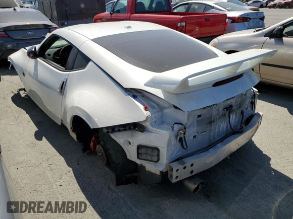 2016 Nissan 370Z with VIN JN1AZ4EH0GM933290, listed as a Copart auction lot 62025304 with 100,275 mi miles and Salvage Title. Bid and sale history available at carsss.com. Image 2.