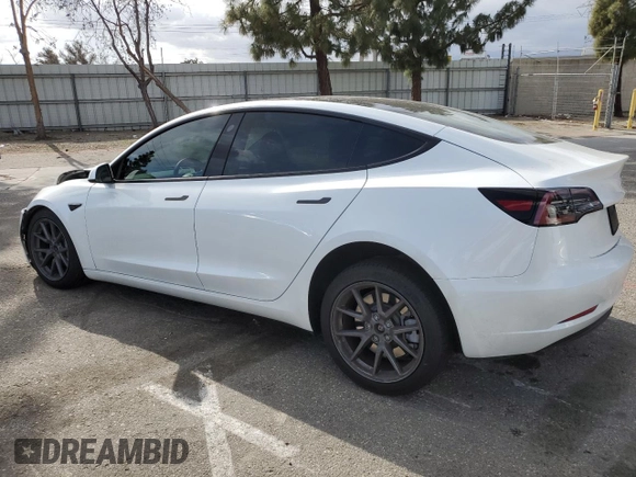 2023 Tesla Model 3 with VIN 5YJ3E1EA5PF486726, listed as a Copart auction lot 51659655 with 14,632 mi miles and Salvage title. Bid and sale history available at DreamBid. Image 2.