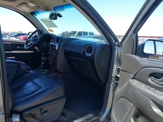 2008 GMC Envoy Denali with VIN 1GKET63M082201867, listed as a IAAI auction lot 41874803 with 218,639 mi miles. Bid and sale history available at carsss.com. Image 5.