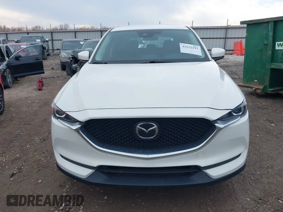 2020 Mazda CX-5 Touring with VIN JM3KFBCM6L0764982, listed as a IAAI auction lot 41632293 with 96,042 mi miles. Bid and sale history available at carsss.com. Image 13.
