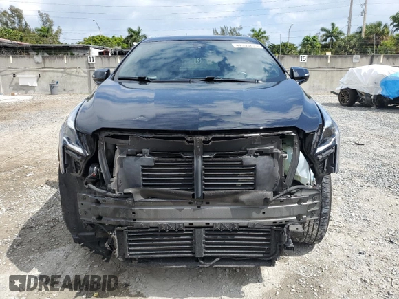 2021 Cadillac XT5 FWD Luxury with VIN 1GYKNAR46MZ127028, listed as a Copart auction lot 47555235 with 48,364 mi miles and Salvage Title. Bid and sale history available at carsss.com. Image 5.