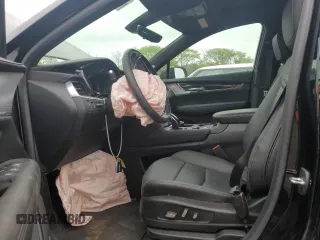 2023 Cadillac XT5 AWD Premium Luxury with VIN 1GYKNDR45PZ224937, listed as a Copart auction lot 57599125 with 12,905 mi miles and Salvage title. Bid and sale history available at DreamBid. Image 7.