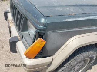 1994 Jeep Cherokee z VIN 1J4FT78S0RL149062, wystawiony jako IAAI lot #41925110 z przebiegiem 281 893 mil mil oraz . Historia ofert i sprzedaży dostępna na DreamBid. Obrazek 14.