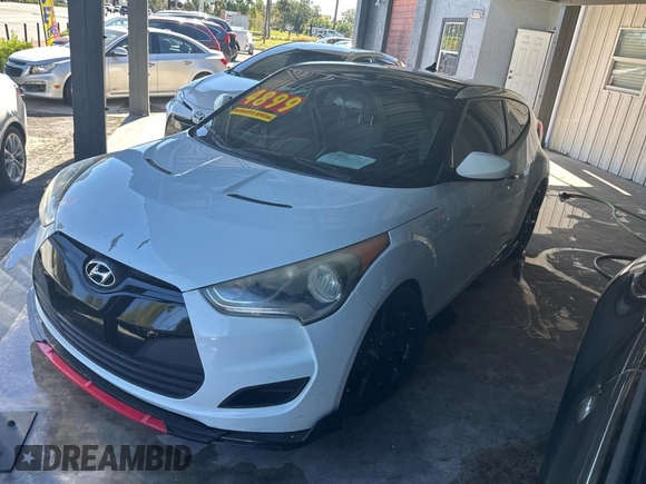 2012 Hyundai Veloster w/Red Int with VIN KMHTC6AD6CU036826, listed as a Copart auction lot 82190224 with 169,497 mi miles and Clean title. Bid and sale history available at DreamBid. Image 2.